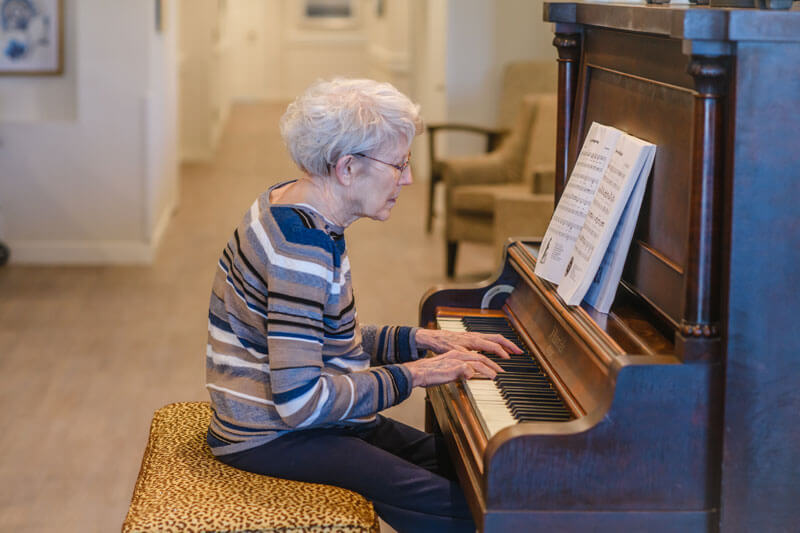 Resident playing piano